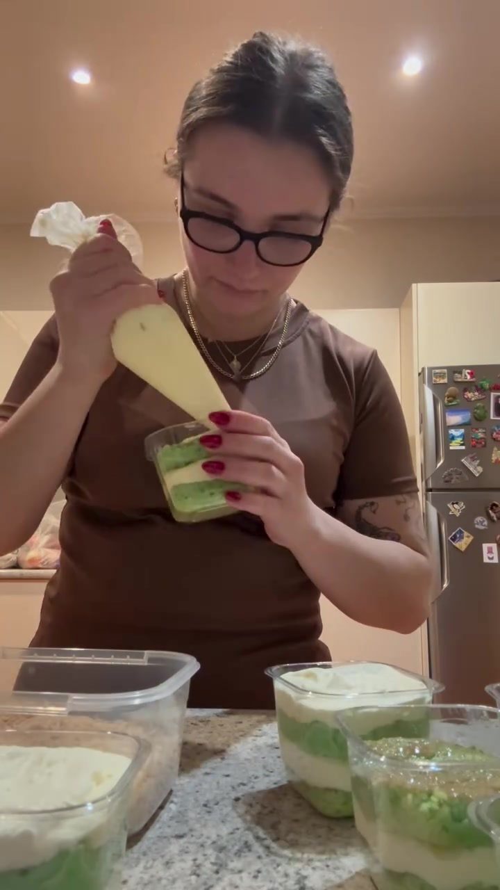 Video preview: Chloe decorating a cake in her home kitchen